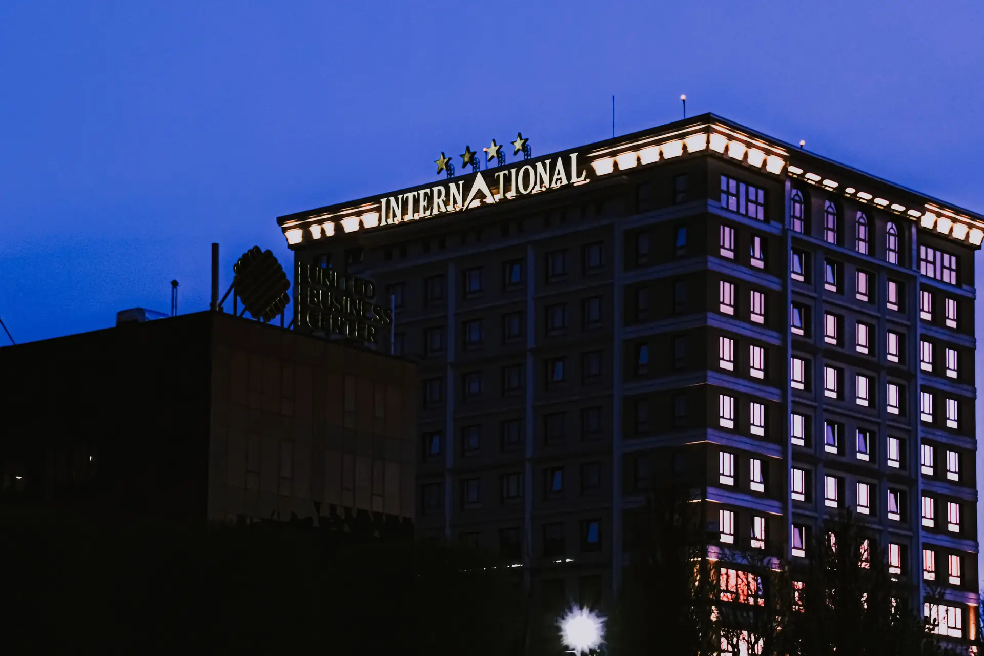 Modern illuminated Canadian luxury casino resort architectural facade at dusk